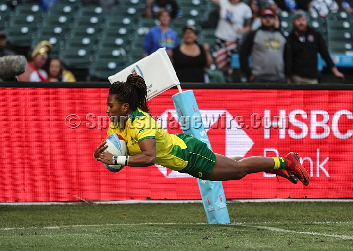 2018RugbySevensSat-41.JPG - Australian player Ellia Green takes a kick in for a try against the United States the women's championship Bronze medal match of the 2018 Rugby World Cup Sevens, Saturday, July 21, 2018, at AT&T Park, San Francisco. (Spencer Allen/IOS via AP)